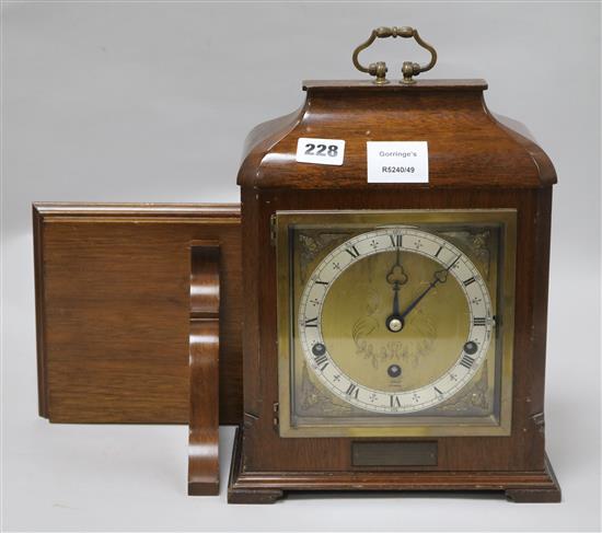 An Elliot mahogany eight day striking and chiming mantel clock, on bracket